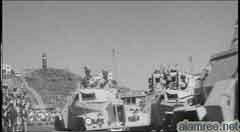 صورة للعر ض العسكري ومرور وحدات رمزية عسكريه من جيش الليوي  